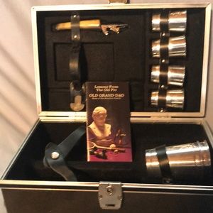 Portable bar. Vintage can carry a bottle of bourbon. Comes with four small cups